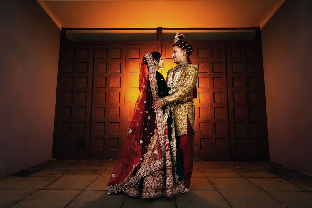 Creative photo of an Indian couple at Bharat Bhavan Temple during their wedding couple photo session.