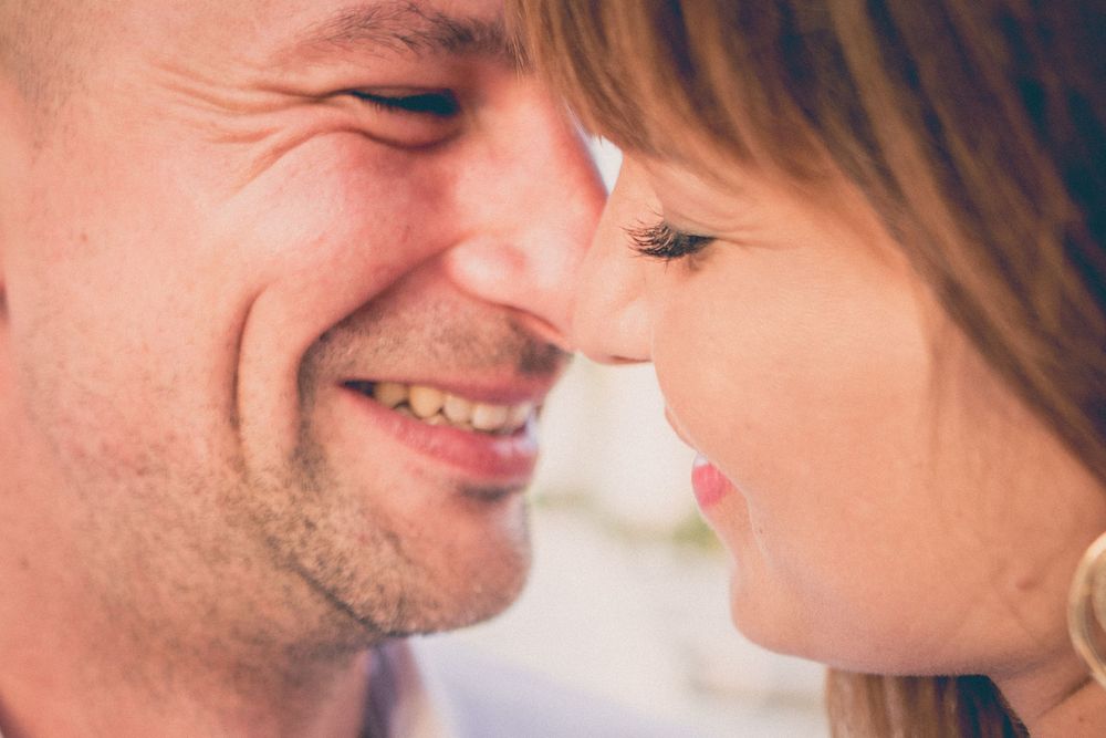 A romantic collage showing close-up moments between a couple sharing tender interactions.