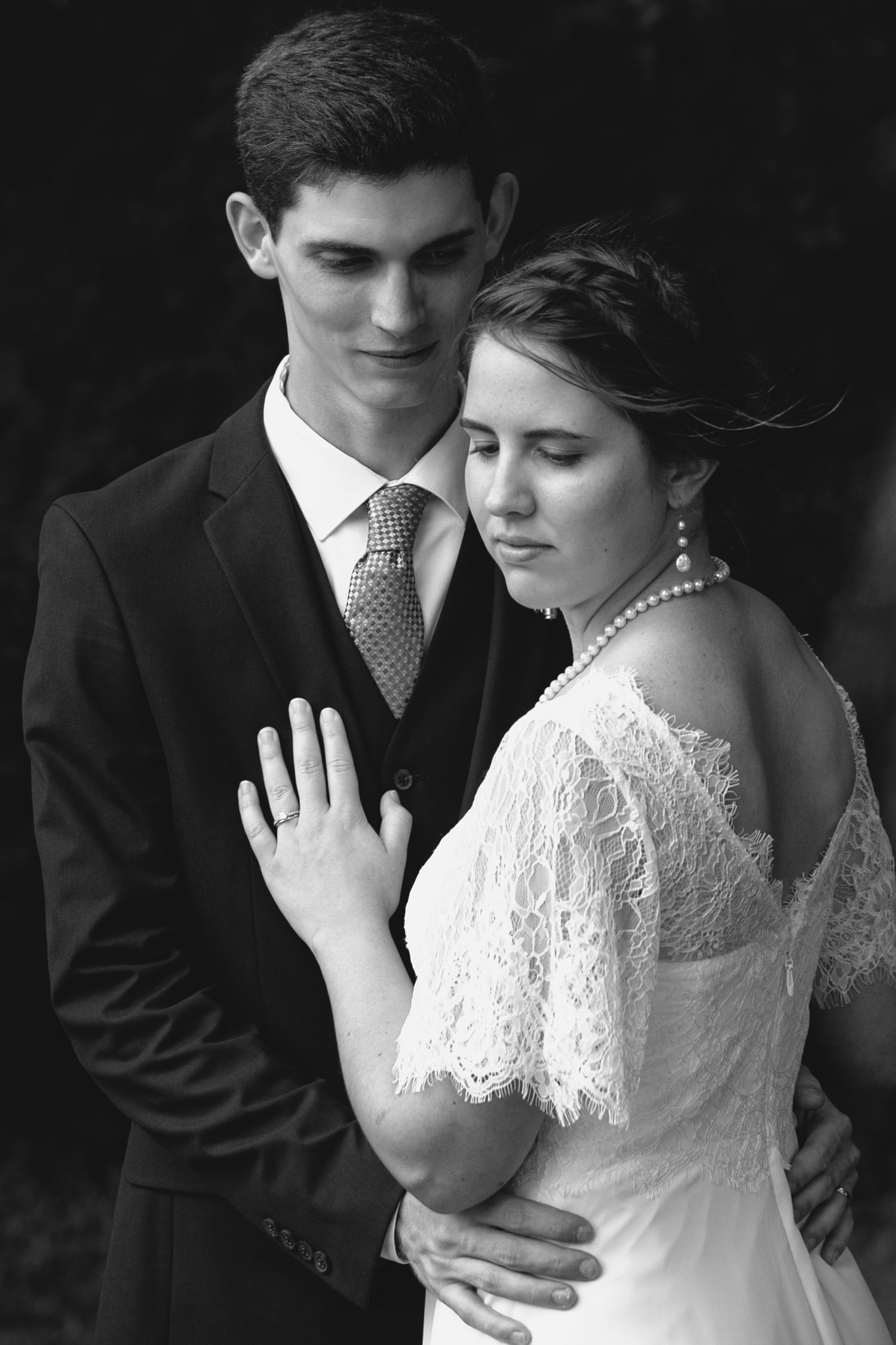 Bride and groom - bride looking away from camera