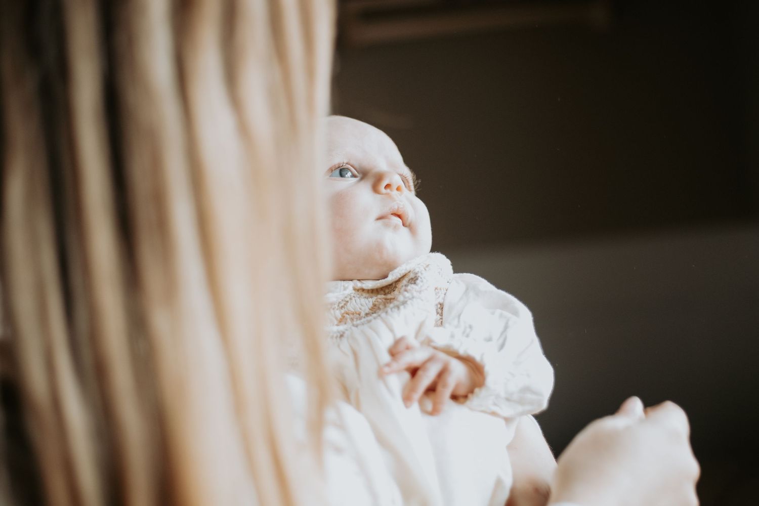 Artistic series of intimate moments captured in soft, moody lighting.