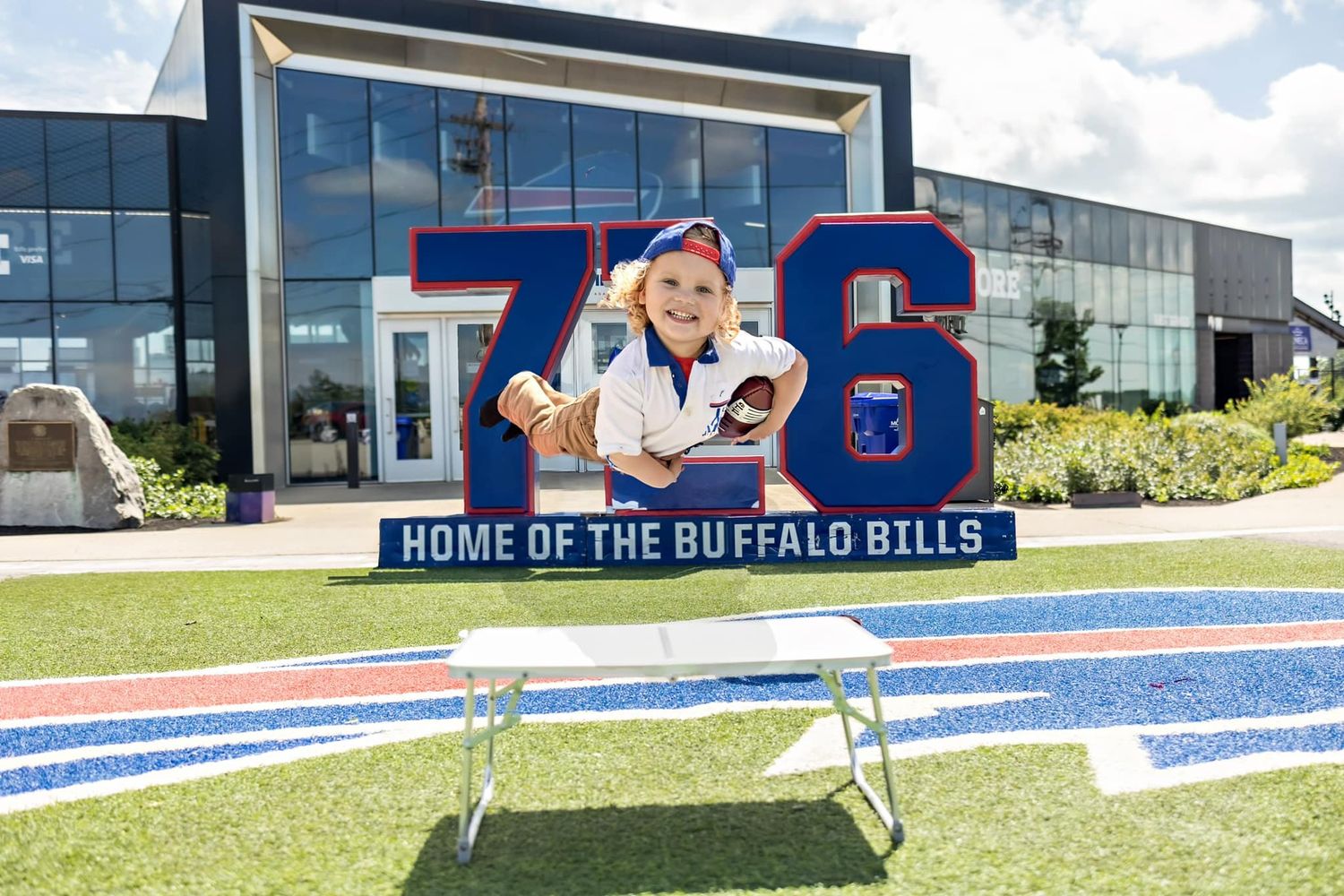 Exterior view of Buffalo Bills stadium with team branding and signage.