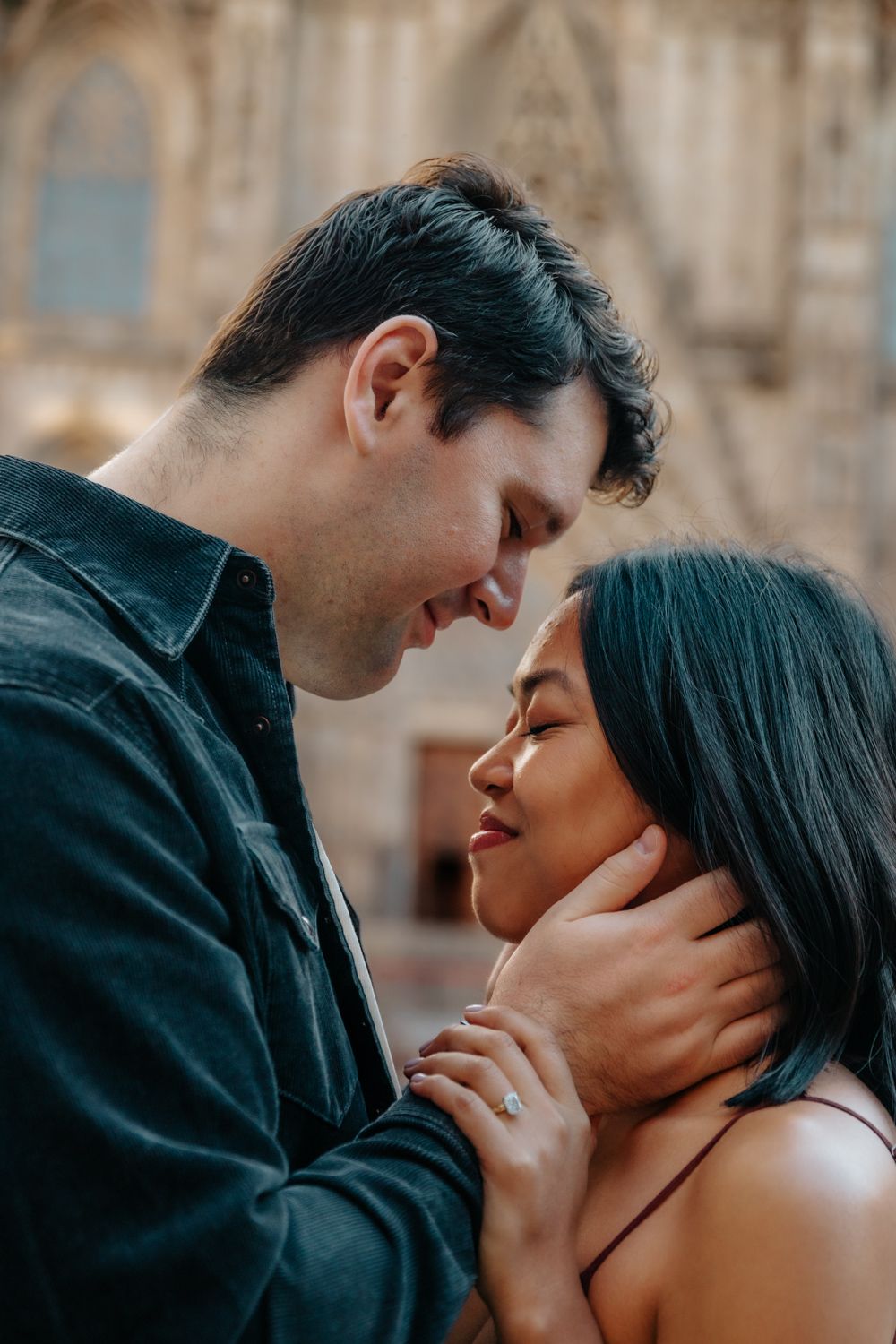 Walking beneath Carrer del Bisbe bridge Engagement photoshoot Barcelona BarcelonaLoversPH