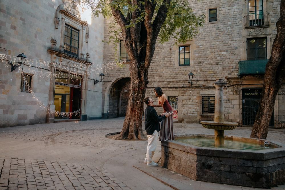 Romantic moment in Plaça de Sant Felip Neri Barcelona Engagement photoshoot Barcelona BarcelonaLoversPH