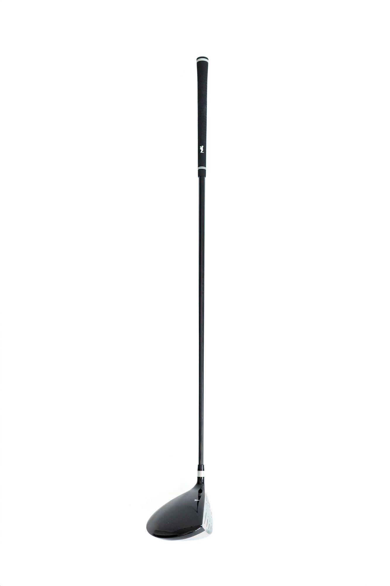 A black golf club driver with a sleek modern design stands upright against a white background for dropout photos for Charlie Golf Co