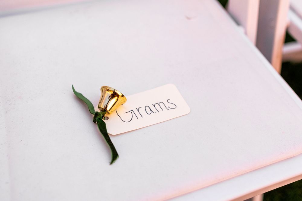 A collection of pink and white wedding stationery and decor items arranged on a light surface.