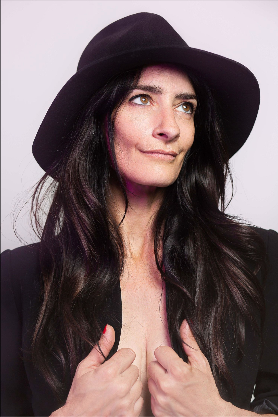 A series of fashion portraits featuring dark hair, a black hat, and dramatic poses against a light background.