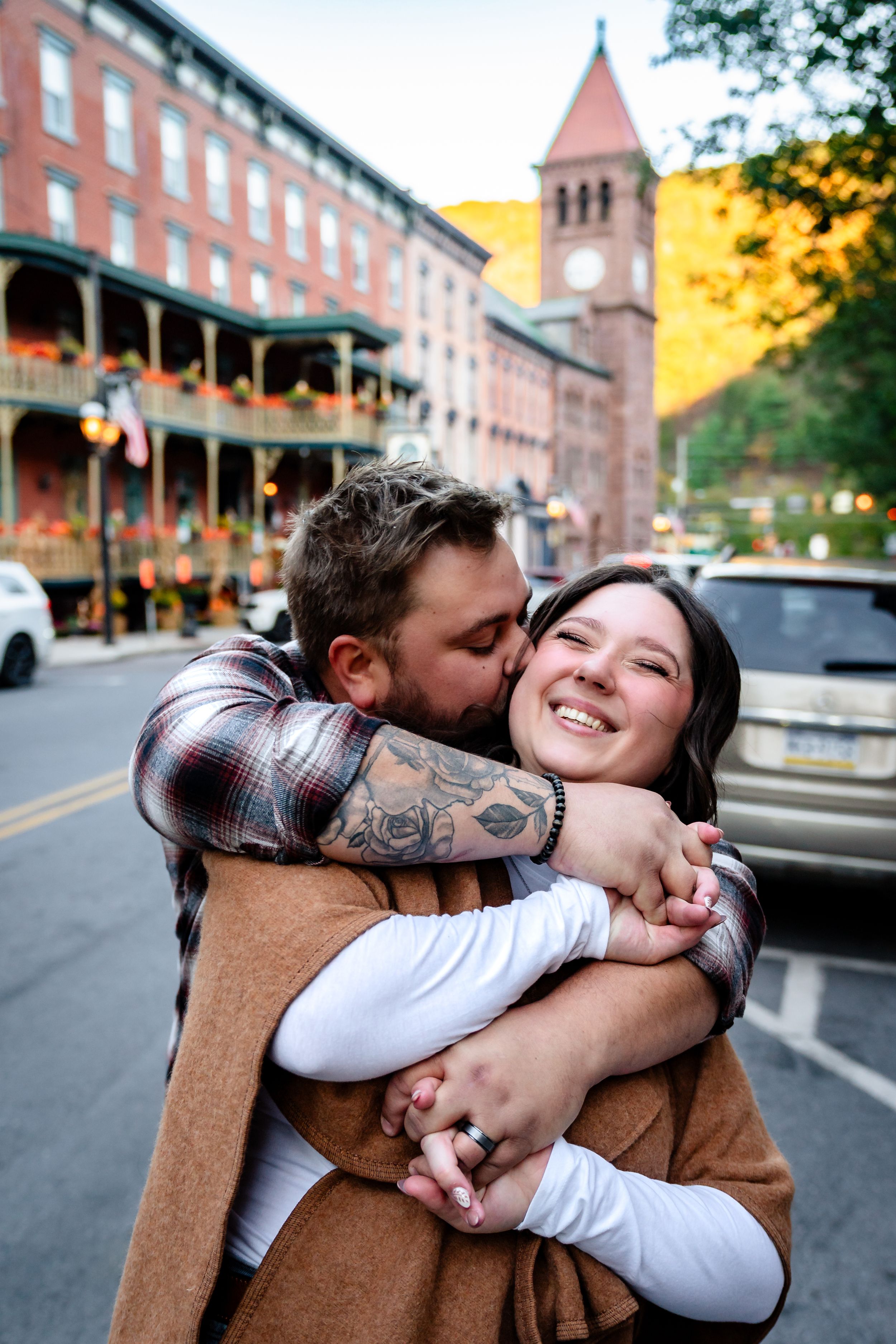 Playful urban photoshoot with historic architecture and warm autumn lighting.