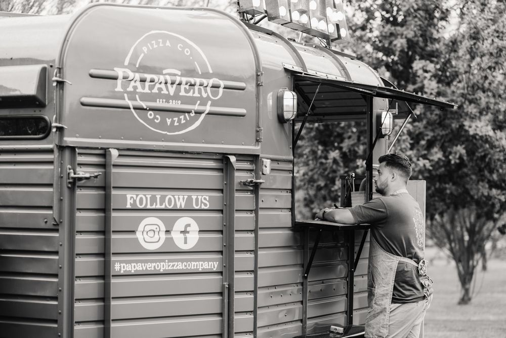 Papavero Pizza truck at the Waterside Country Barn and Mill wedding lakeside venue near Taunton, Somerset .