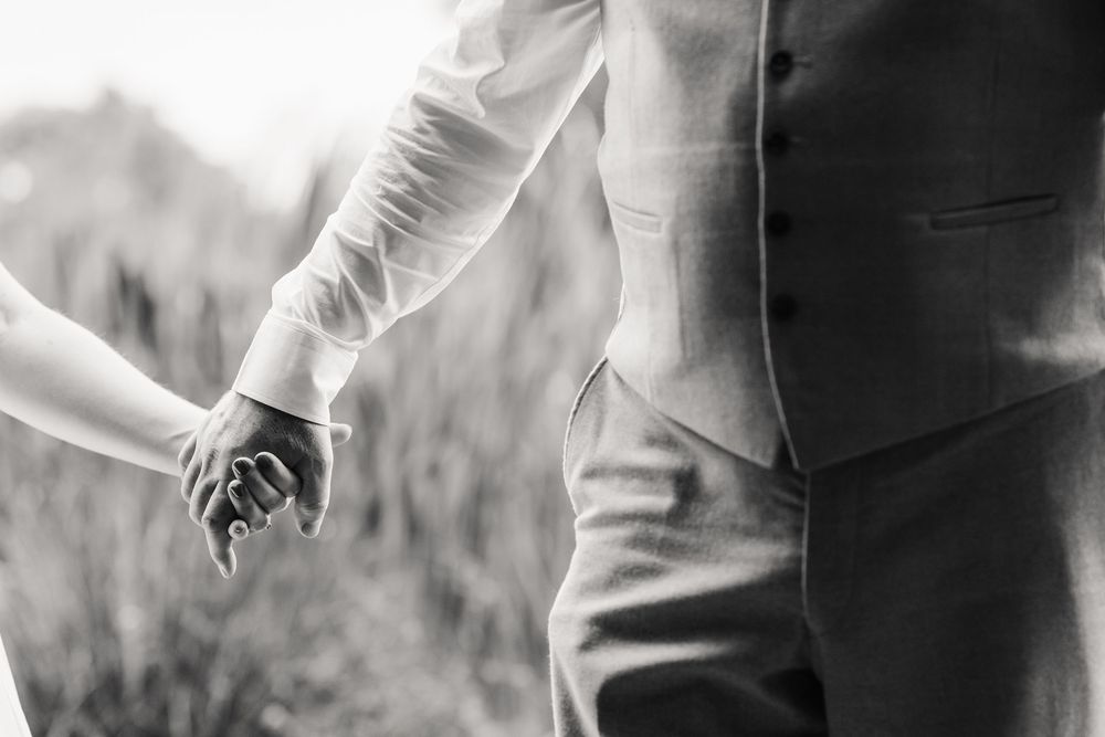 Bride and Groom at the Waterside Country Barn and Mill lakeside wedding venue near Taunton, Somerset. Relaxed Somerset Wedding photographer