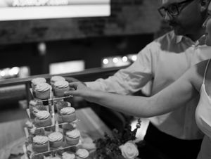 Elegant champagne toast setup with multiple glasses arranged in rows.