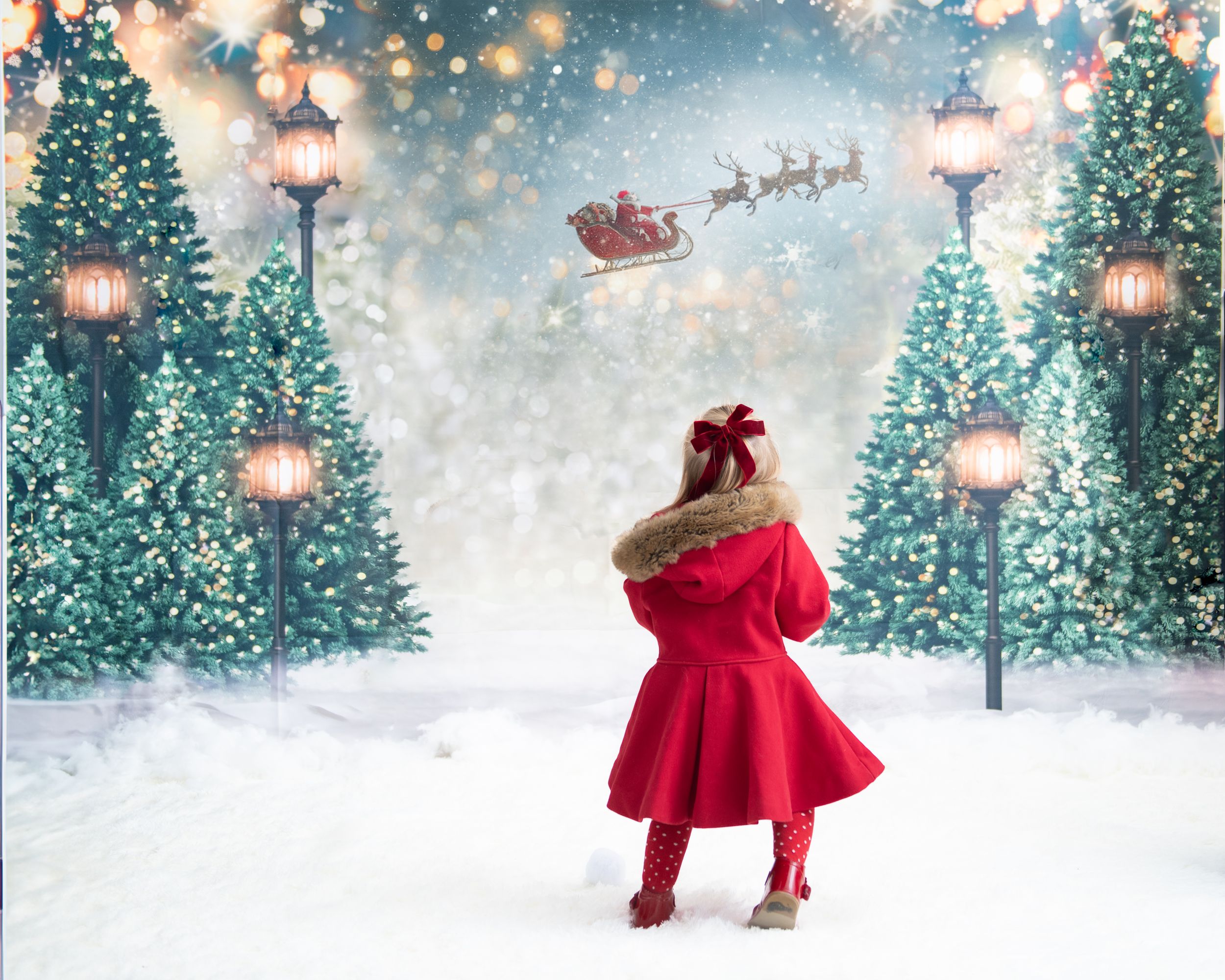 A magical winter scene with Santa's sleigh flying over snow-covered evergreen trees and glowing lanterns at dusk.