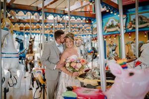 Bride: @michelleerinspencer and Groom: @awspence92 at Anderson Pavilion carousel