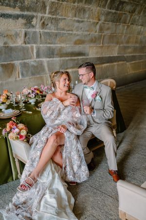 Natural-light portrait of the couple beside the Ohio River at Anderson Pavilion during a Cincinnati styled shoot.