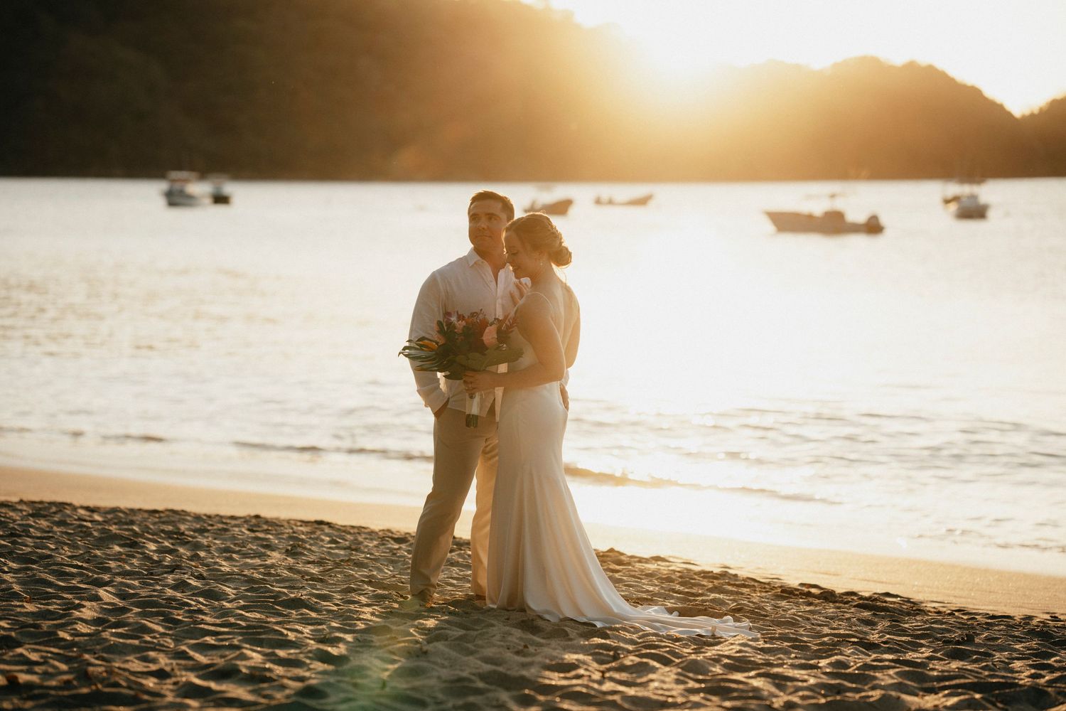 romantic portrait of newlyweds during golden hour - guanacaste wedding photography