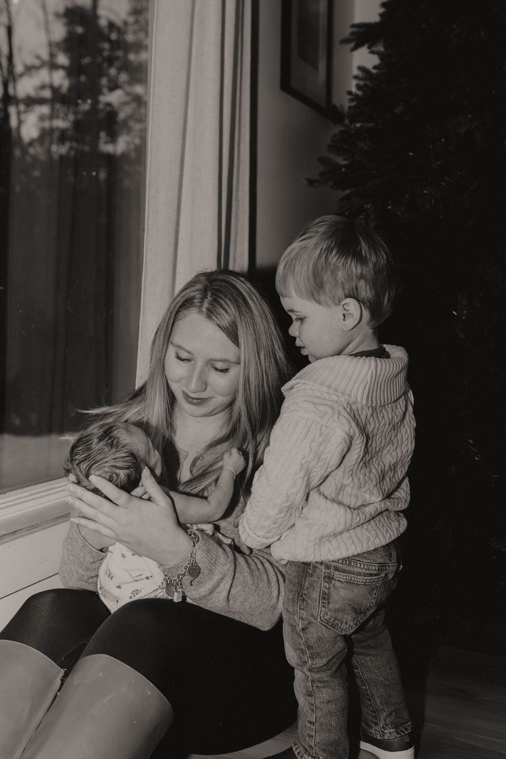 Newborn photoshoot capturing sweet, fleeting moments.