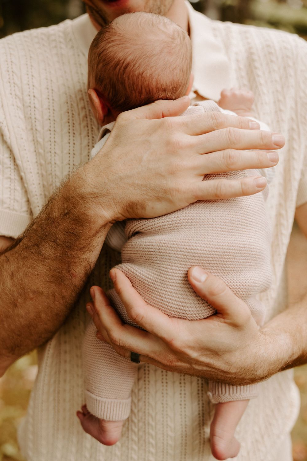 Newborn photoshoot capturing sweet, fleeting moments.
