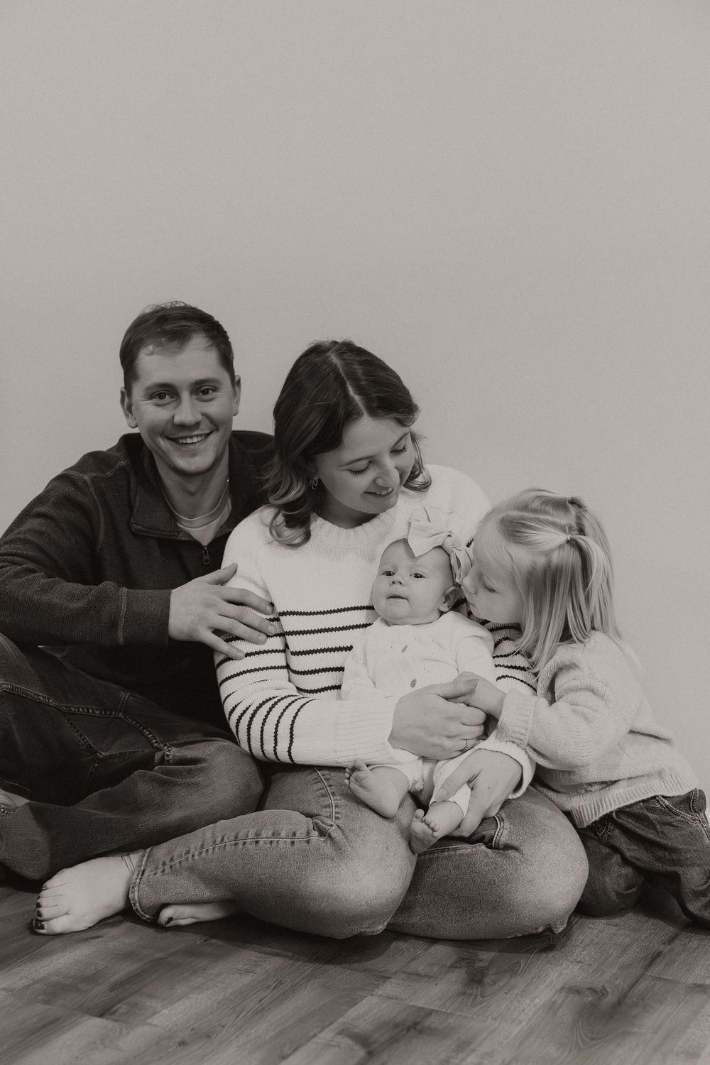 Newborn photoshoot capturing sweet, fleeting moments.