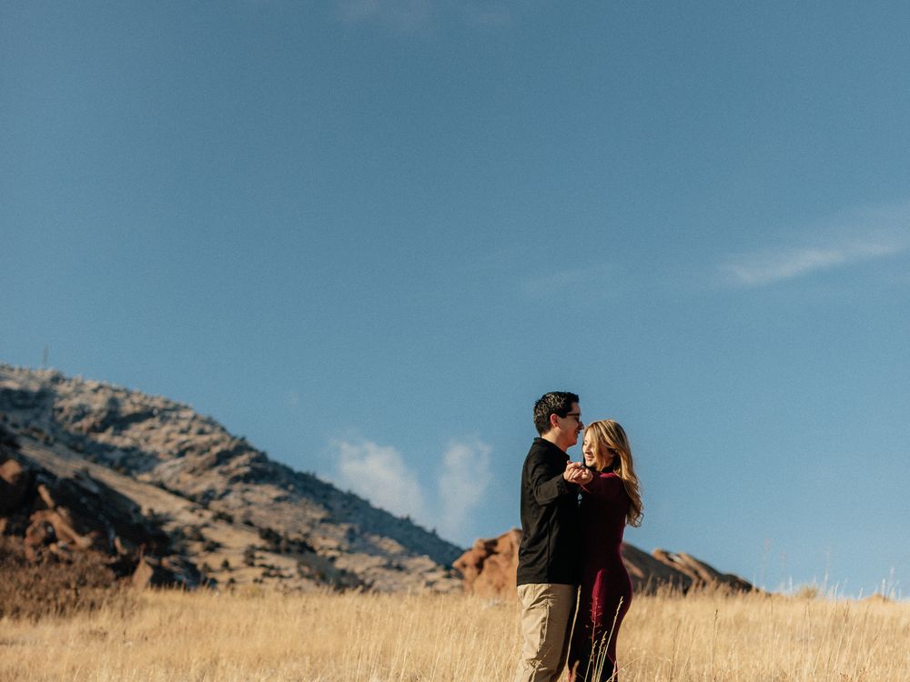 A panoramic collage of mountain landscapes with people enjoying scenic views against rugged peaks and golden fields.