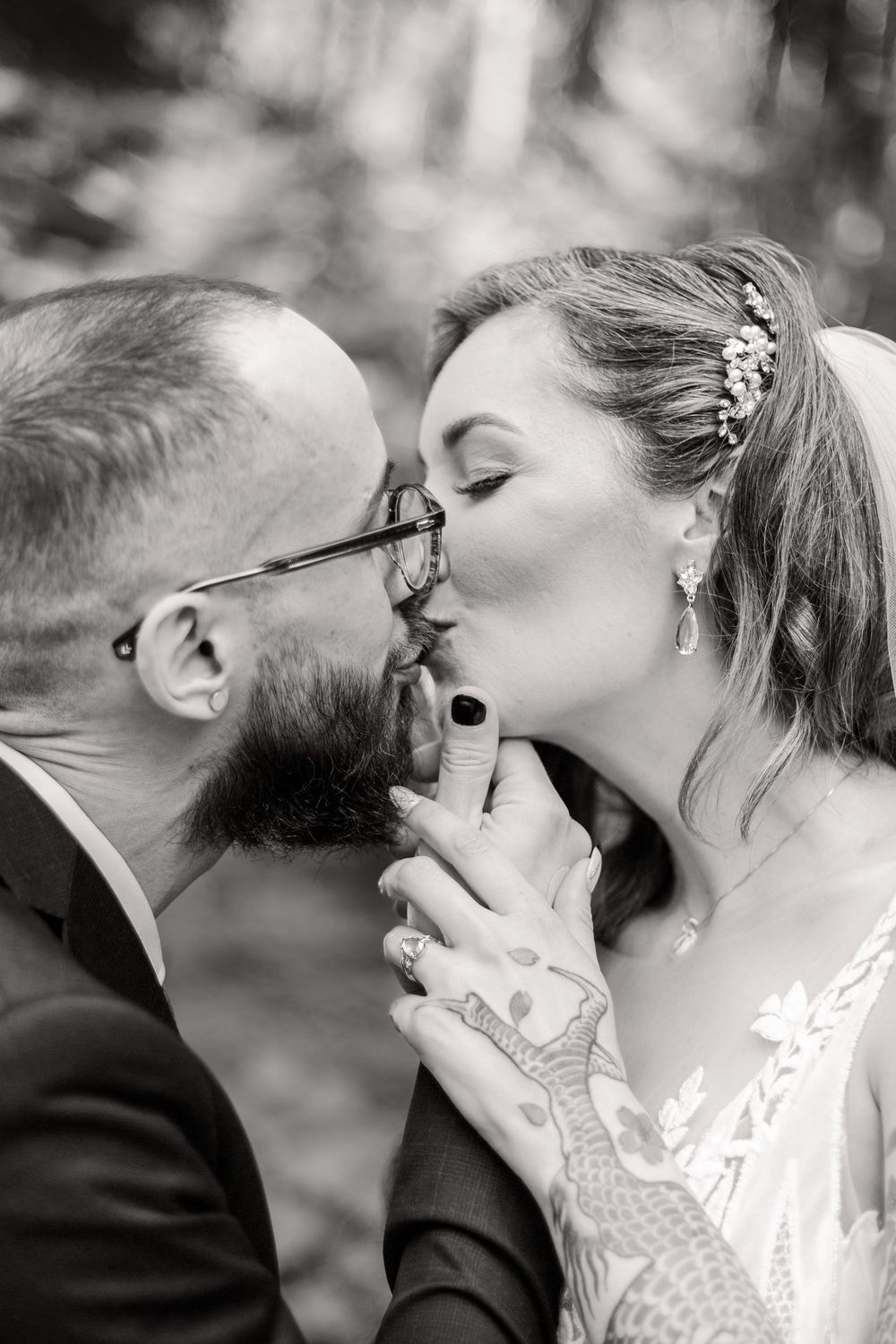 Black and white sequence of romantic wedding kiss in artistic composition.