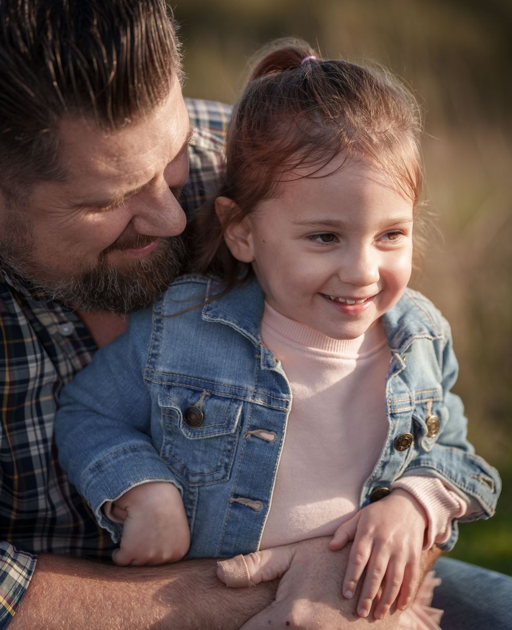 A heartwarming sequence of playful moments between parent and child in casual attire against a blurred background.