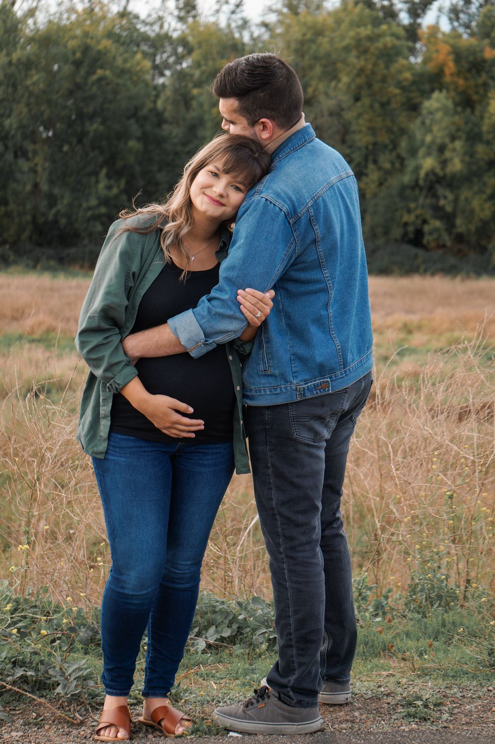 Couple embracing outdoors during a fall photo session in Tri-Cities WA