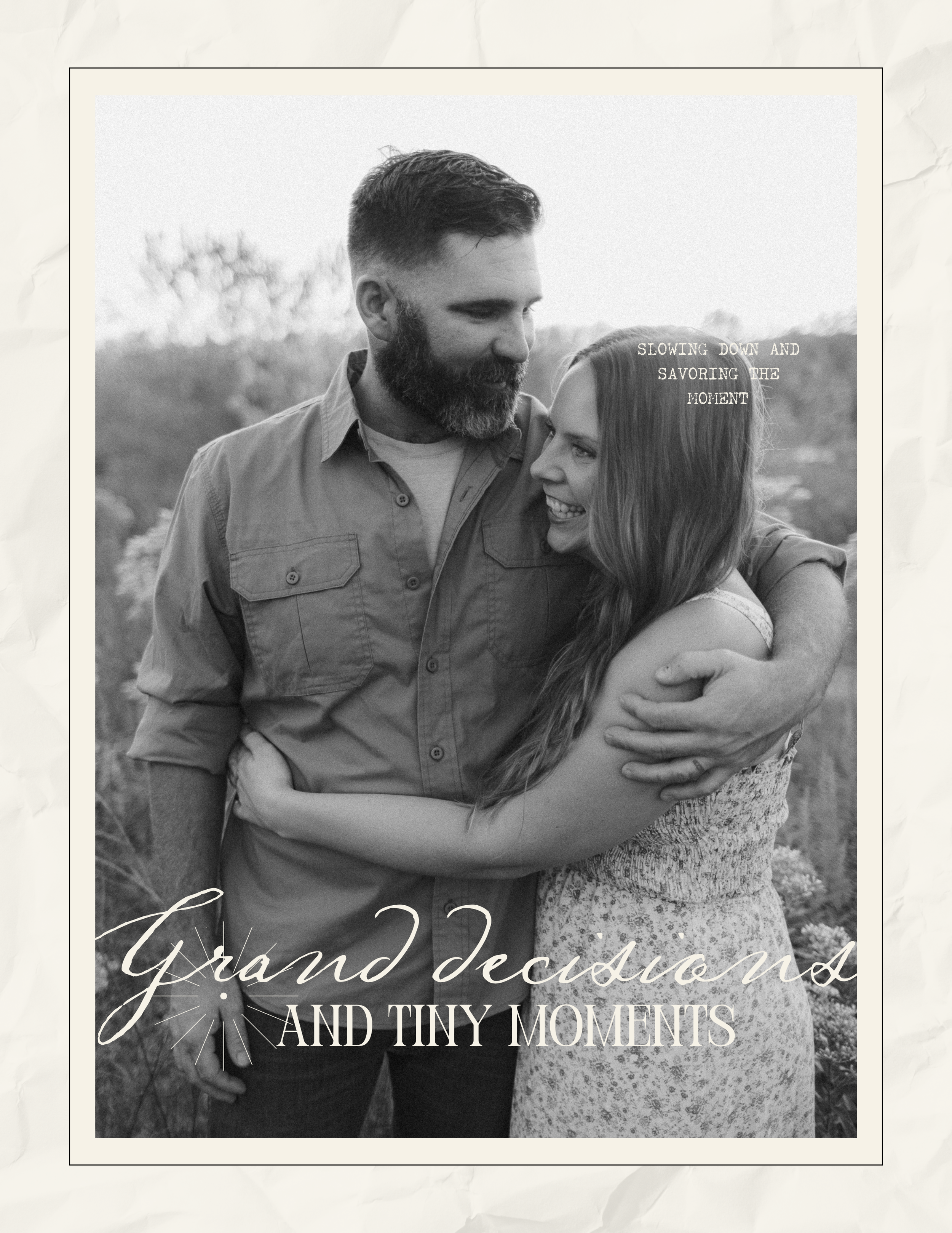 A romantic black and white candid portrait of an embracing couple in casual attire outdoors at sunset.