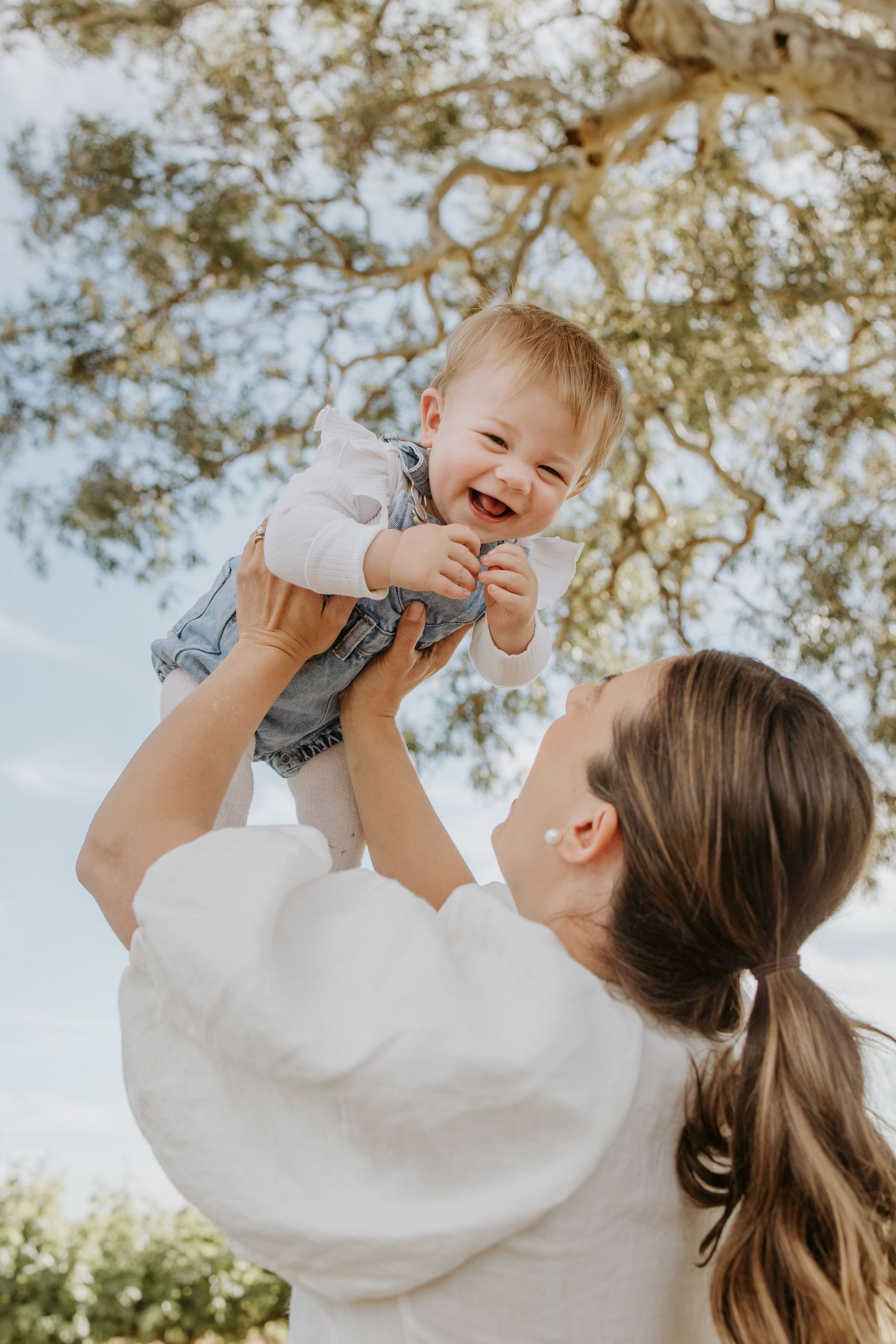 Mother and child sharing a tender moment in a family photo session.