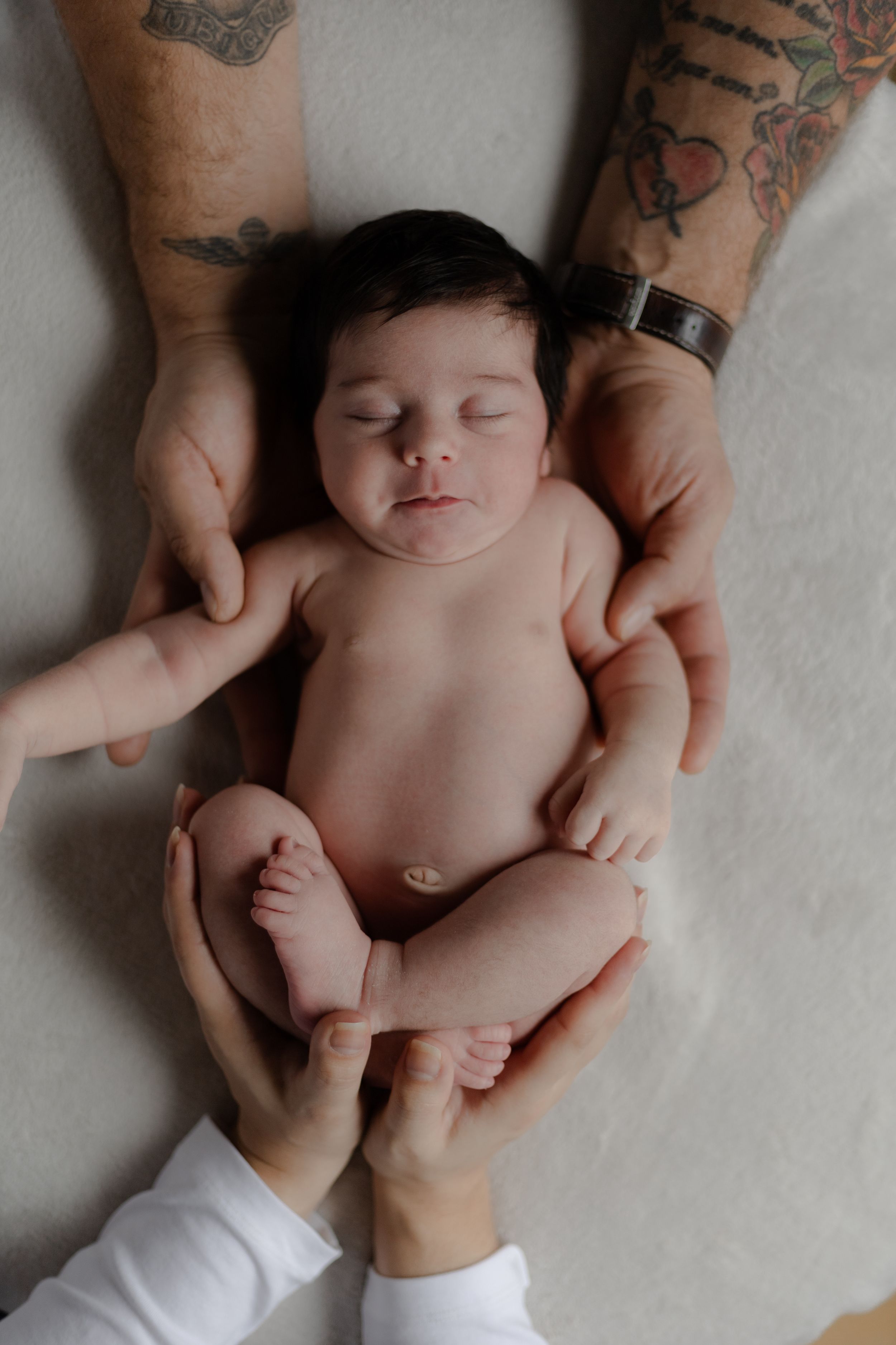 Jess Robyn Photography newborn session with Kitchener-Waterloo couple, at home newborn lifestyle session with their new baby girl.