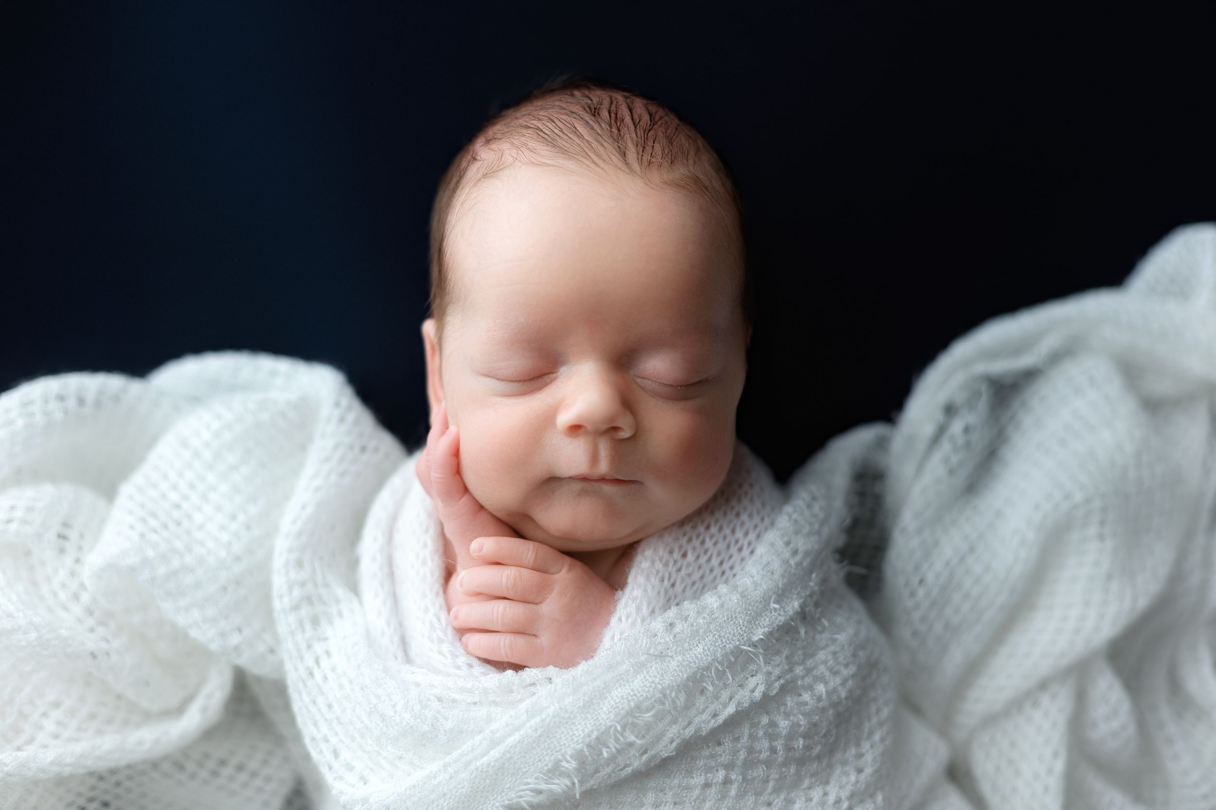 Newborn baby boy in white wrap. Greenville SC newborn photographer, Easley SC newborn photographer