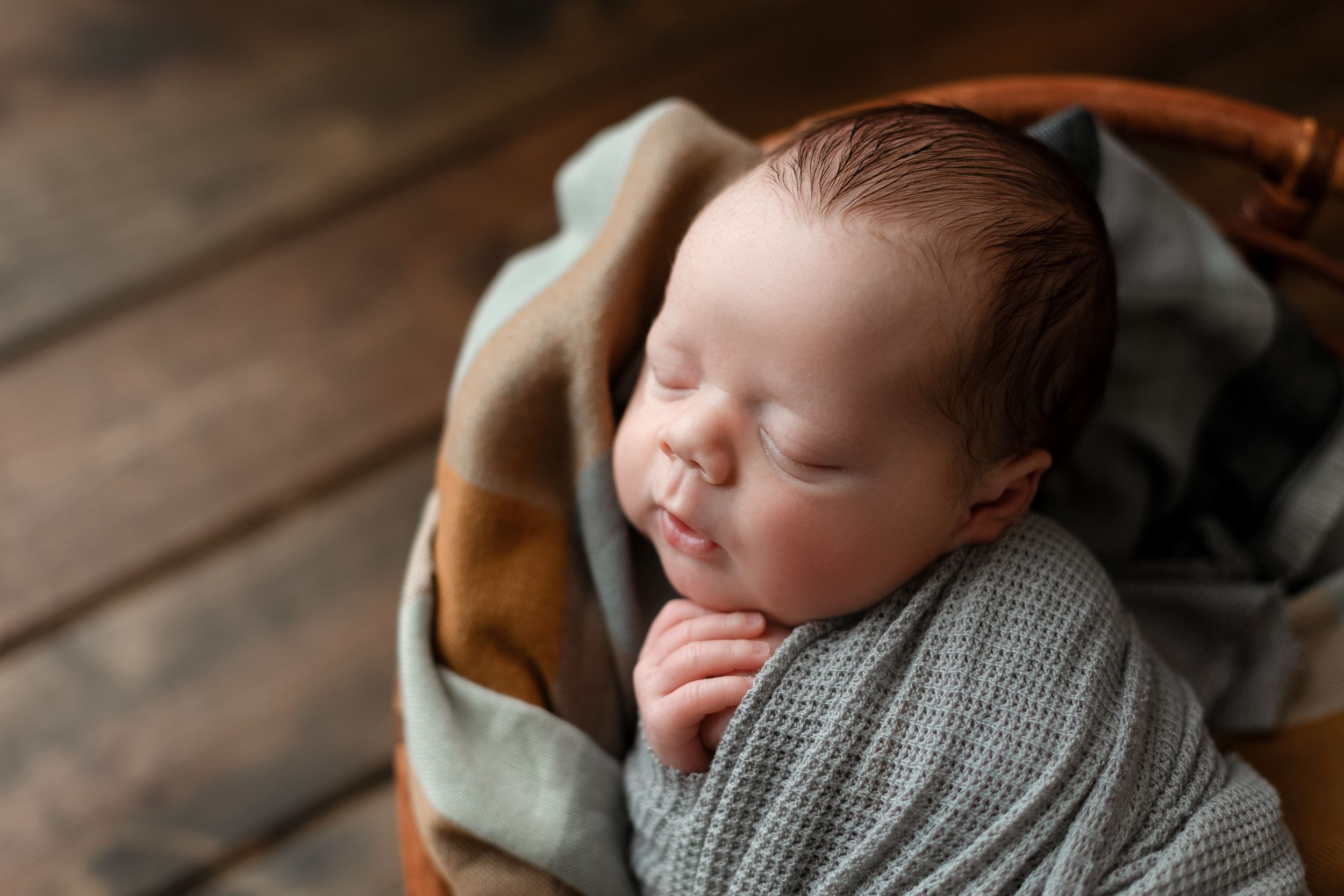 Newborn boy profile shot on wood. Greenville SC newborn photographer, Easley SC newborn photographer