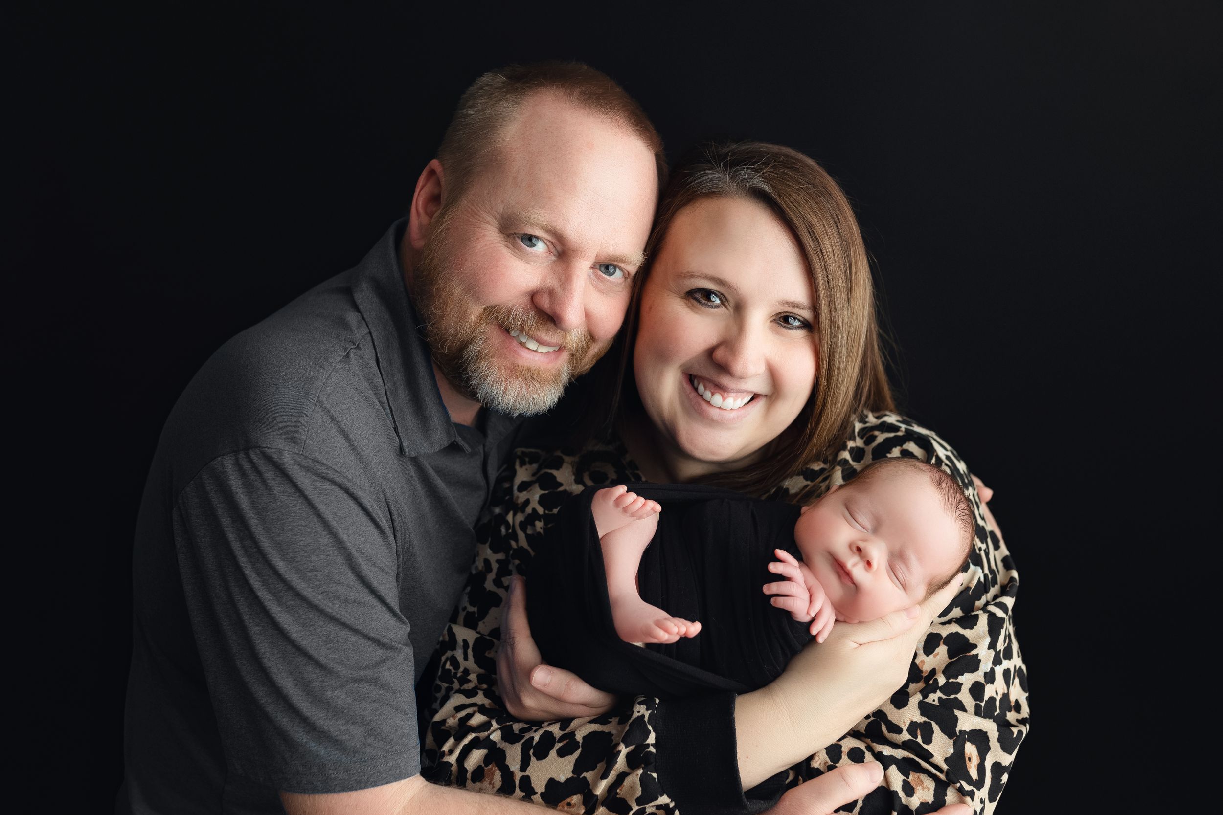 Mom and Dad holding newborn. Greenville SC newborn photographer, Easley SC newborn photographer
