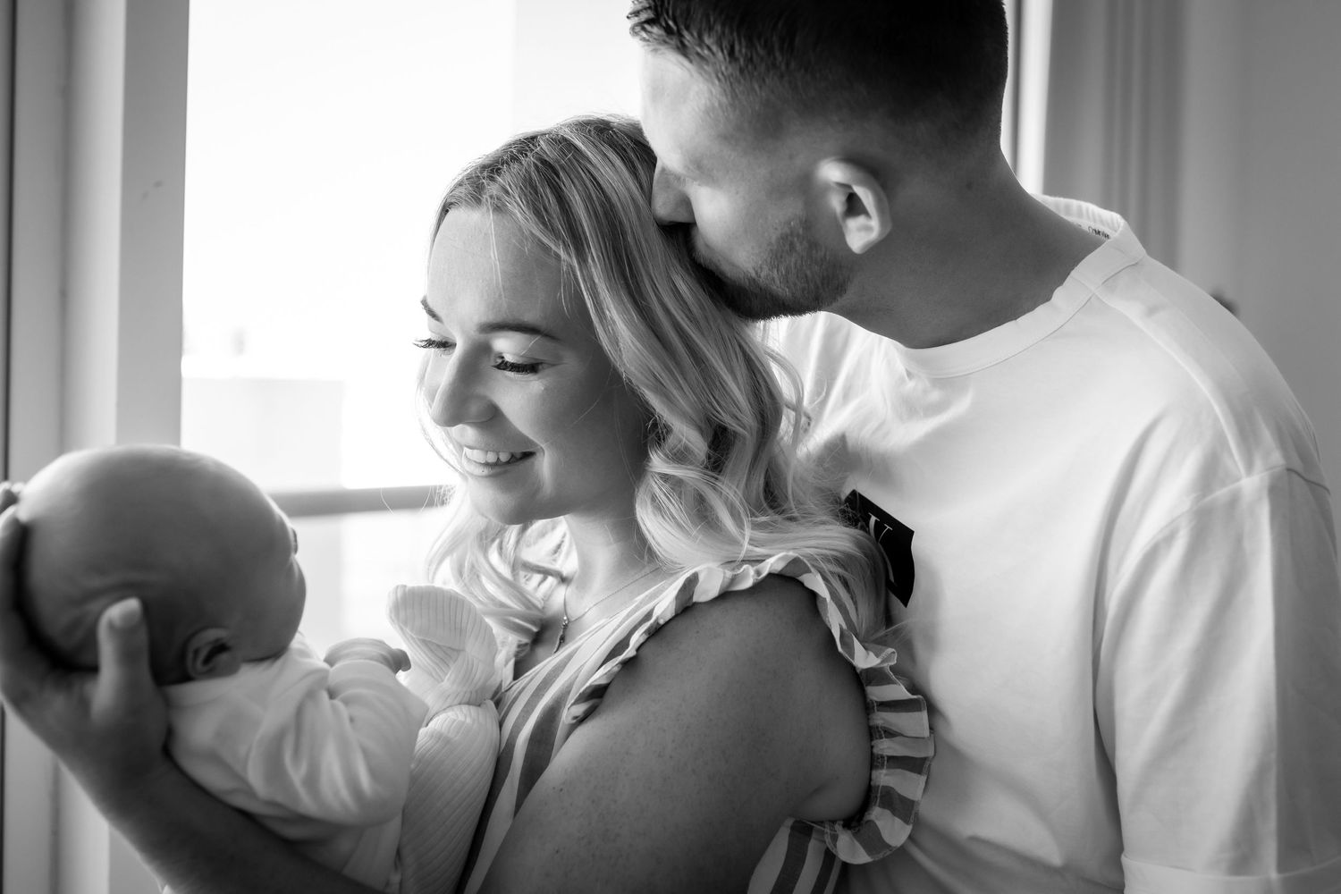 Newborn photoshoot at home lifestyle relaxed real and raw in abu dhabi