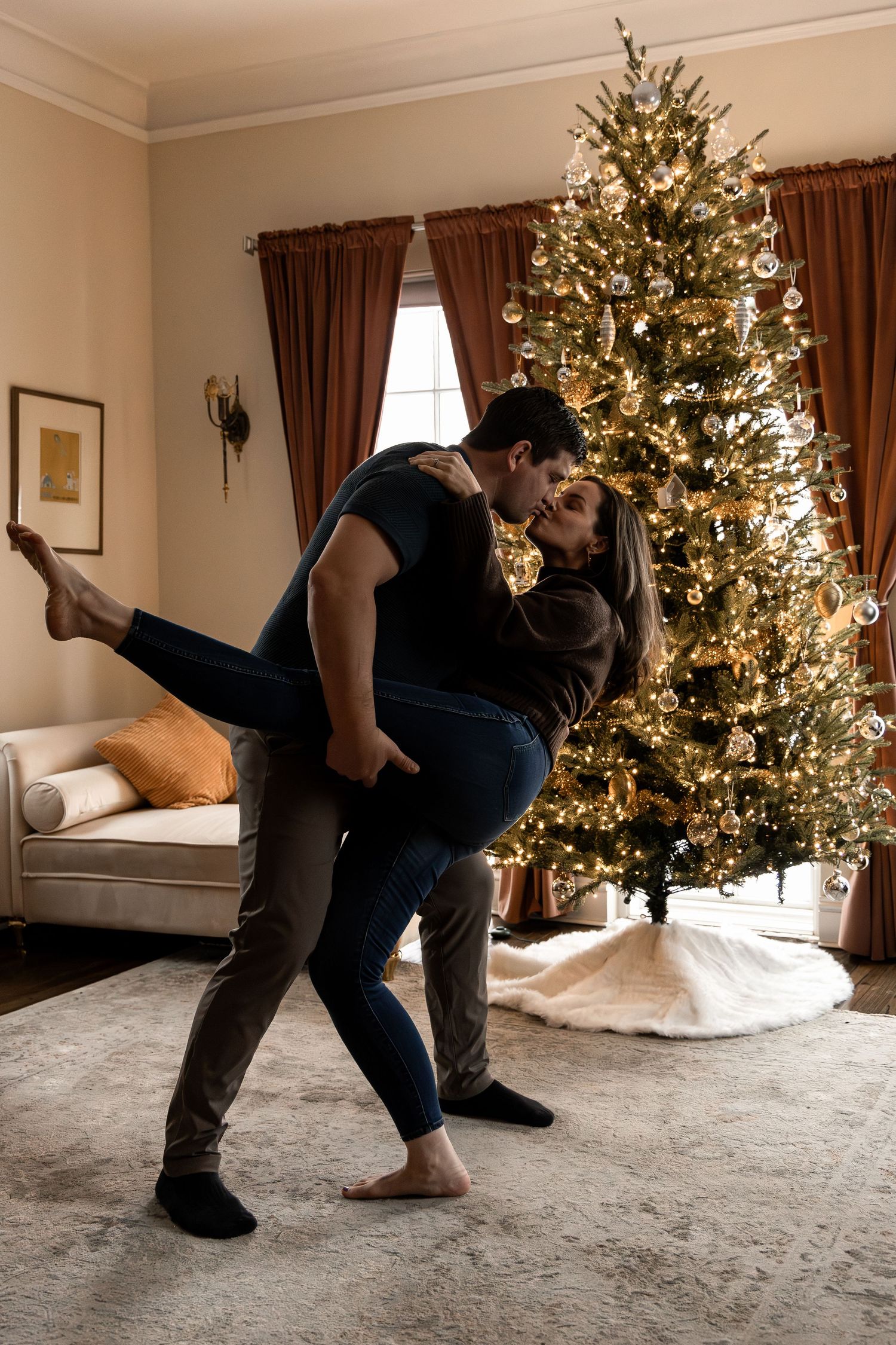 A sequence of photos showing two people practicing martial arts or self-defense moves in a living room with a Christmas tree.