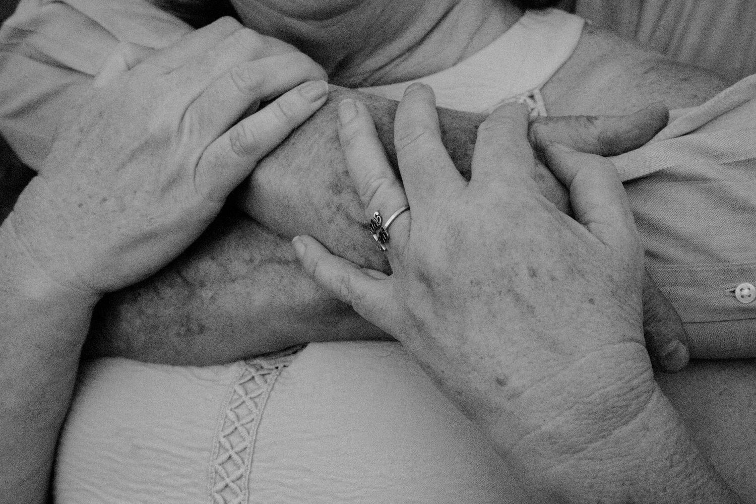 man hugging woman