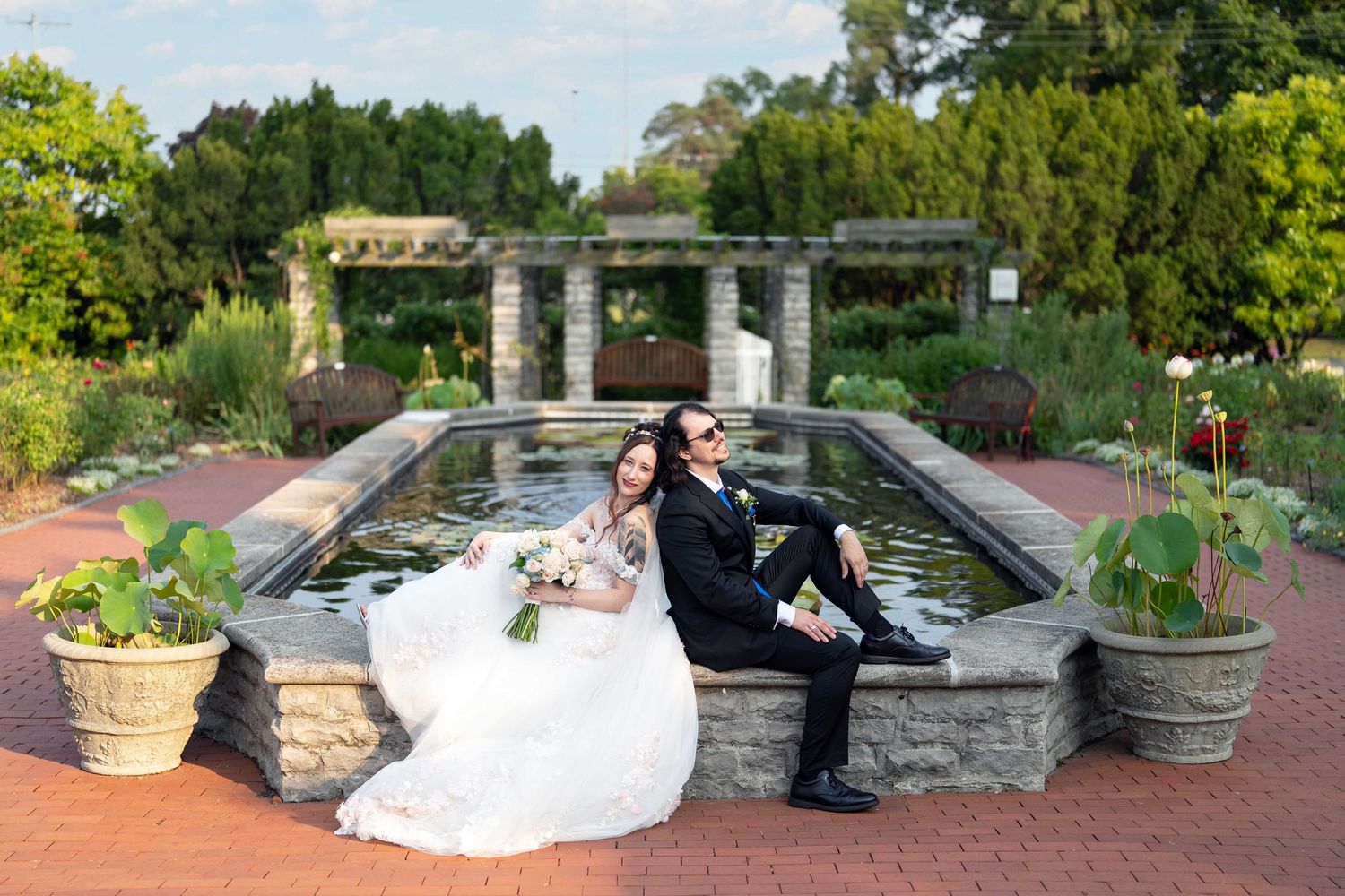 Bride and groom posing at Toledo Zoo Wedding Venue