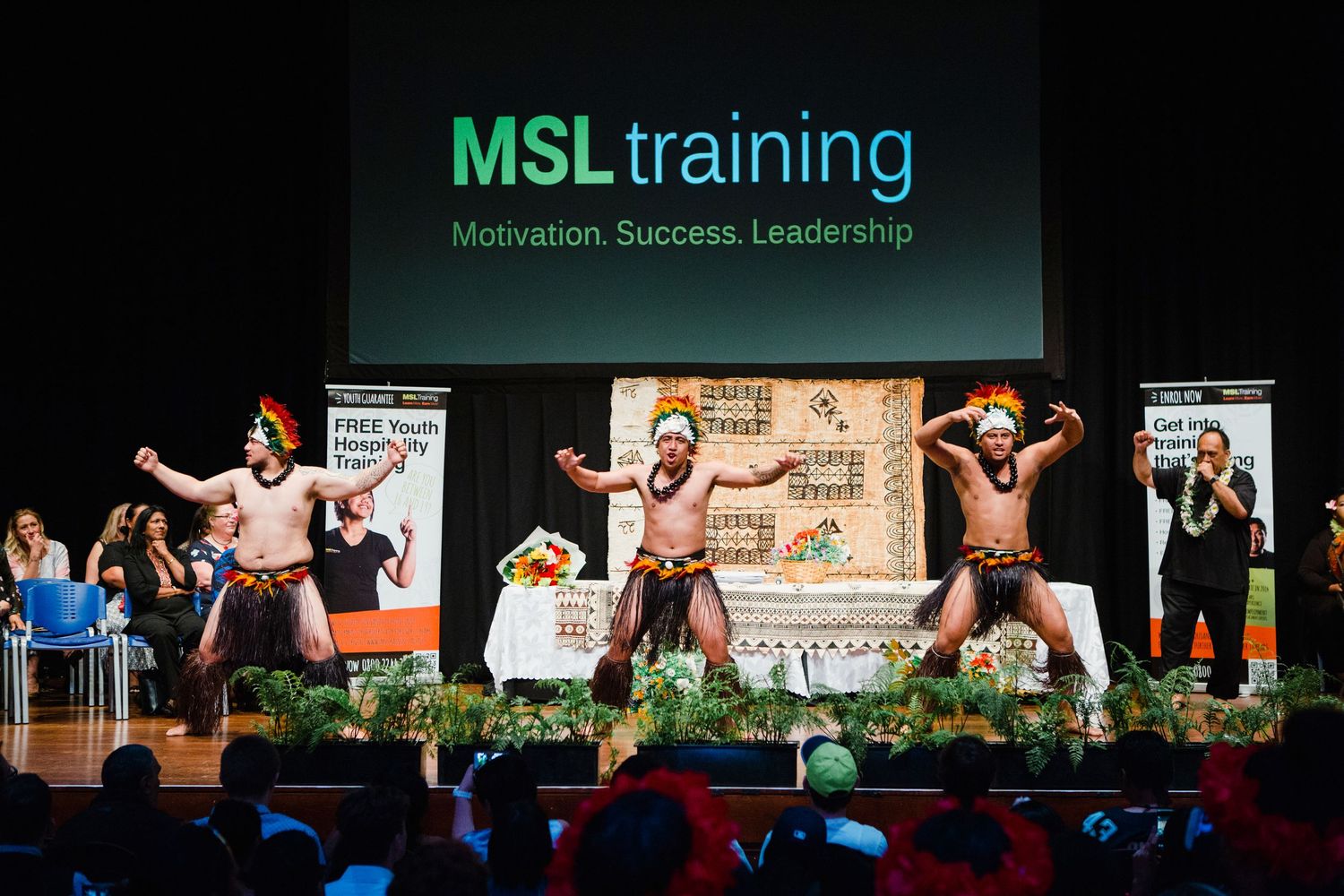Event videography capturing graduation event entertainment on stage in Auckland