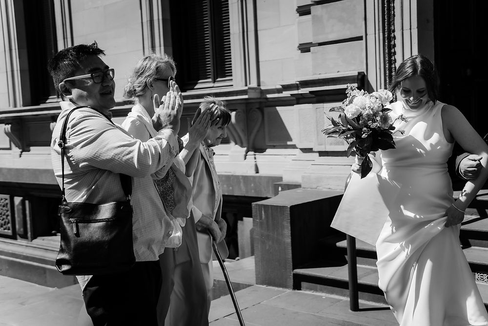 Black and white photographs showing people in a sequence of dancing or movement positions.