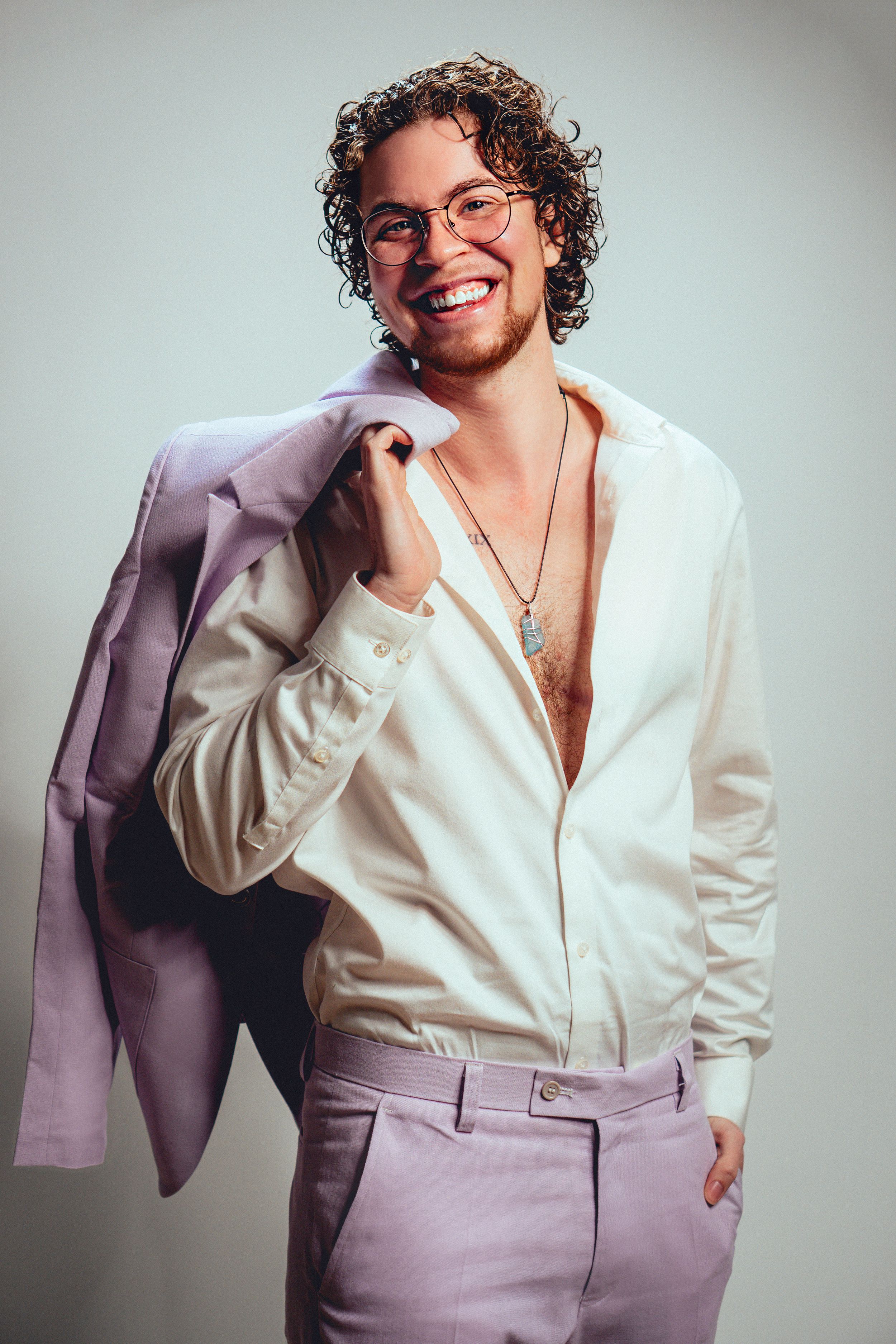 A professional fashion photo series showing stylish lilac suit pants paired with a crisp white button-down shirt.