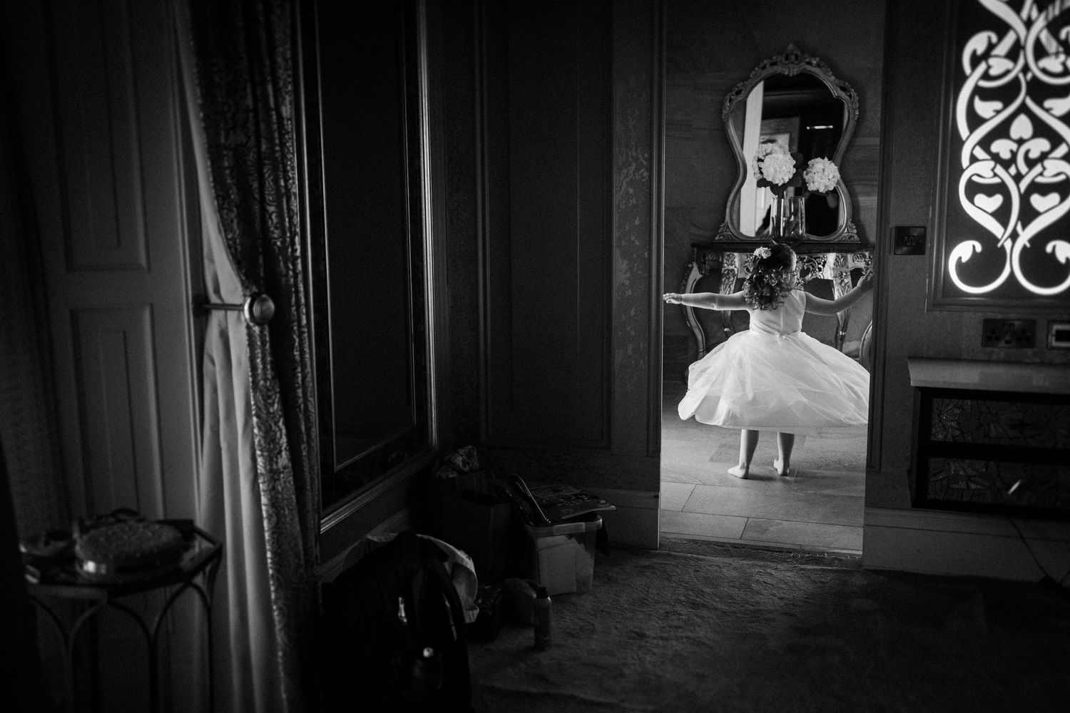 Dramatic black and white corridor shots with illuminated doorway.