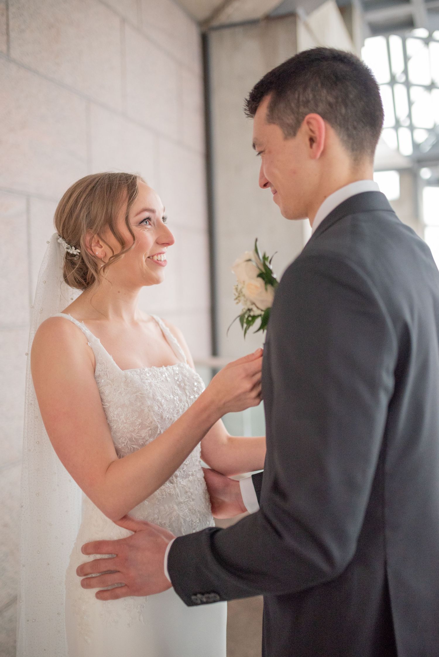 Bride and groom portraits and exchange private vows inside the National Gallery of Canada