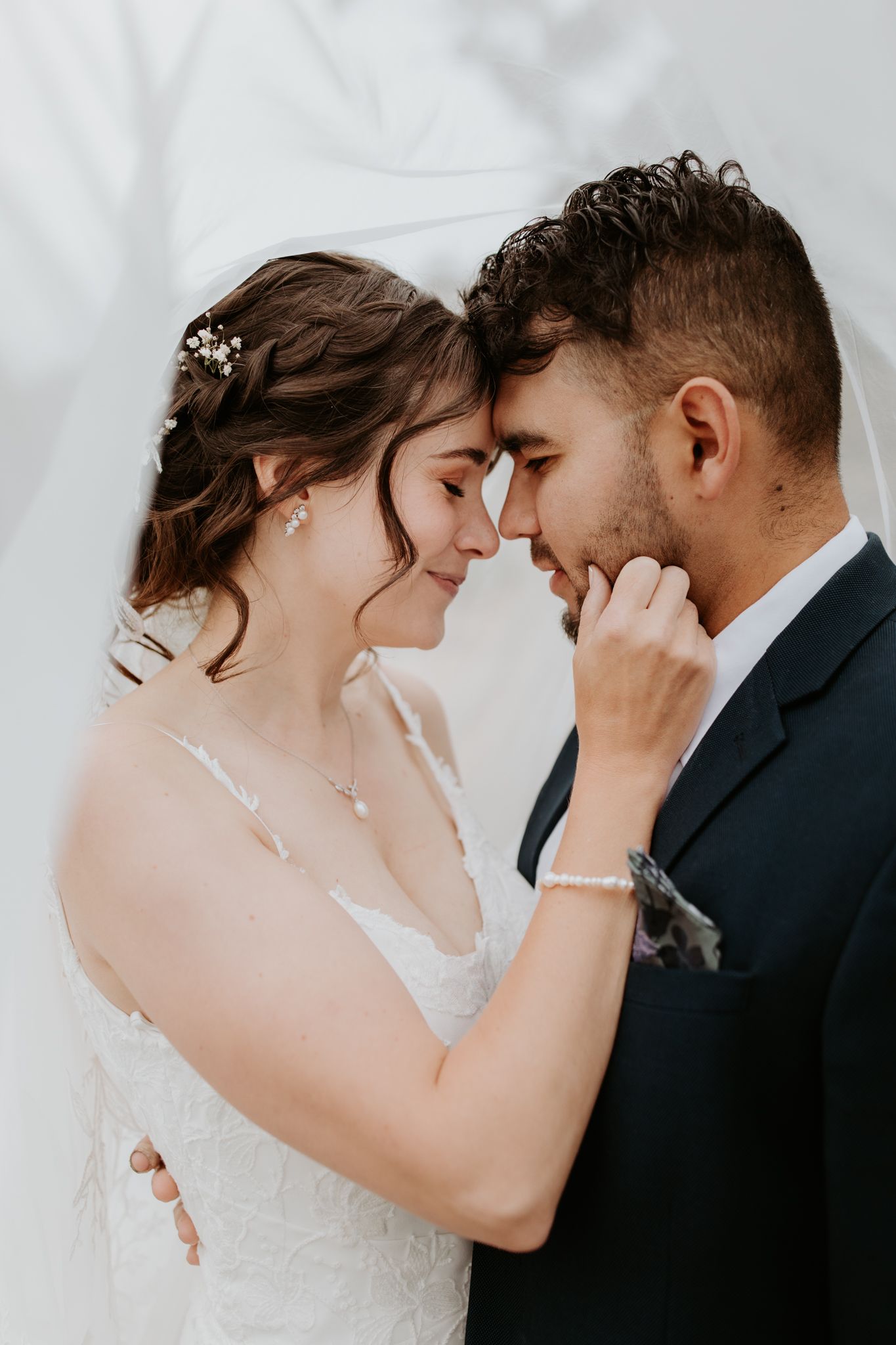 A private moment under the veil between a couple on their wedding day captured by Lauren Lunn Photography, an Adelaide based Photographer.
