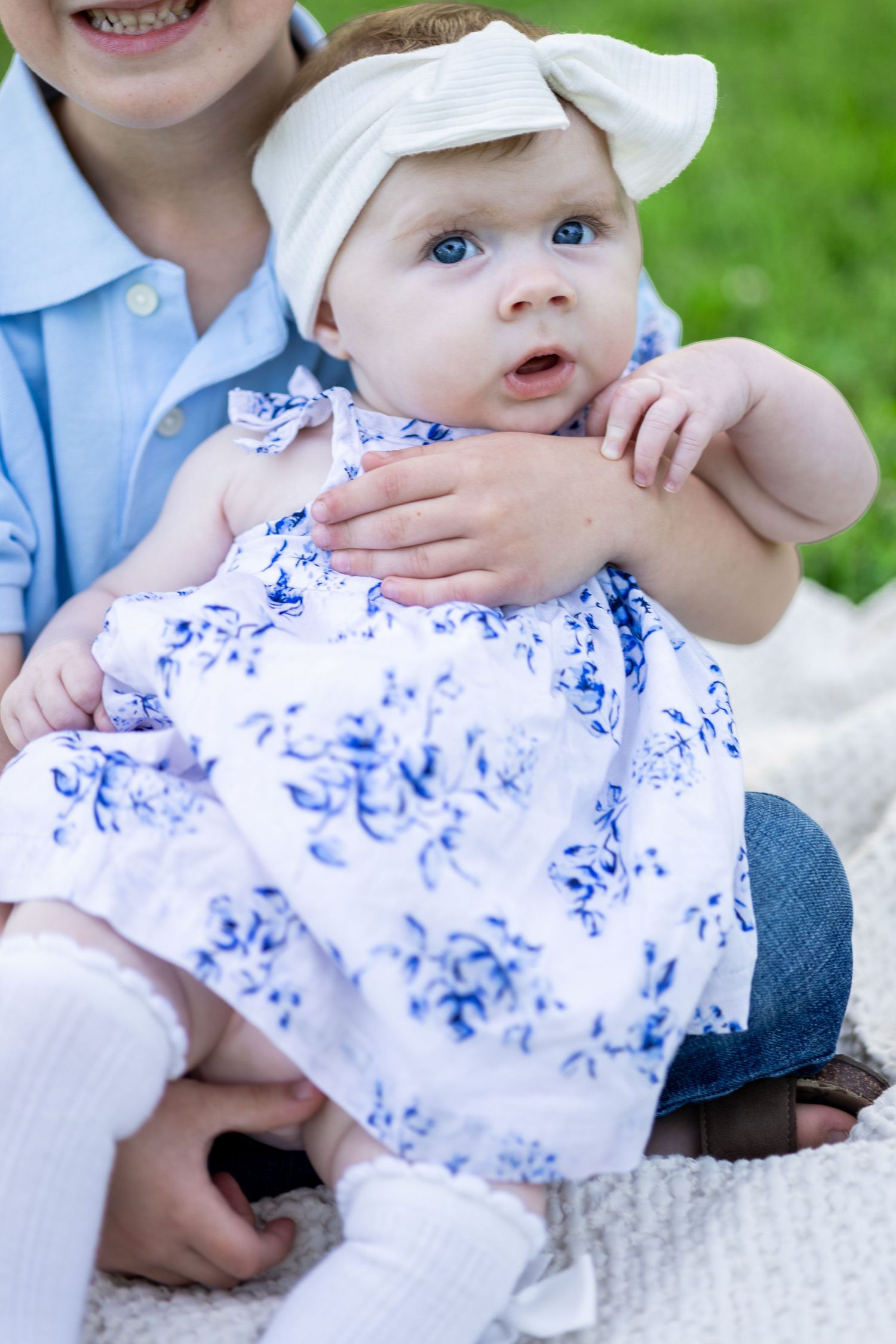 Central Illinois family photographer captures a close up of a baby girl during a photo session in Springfield, IL