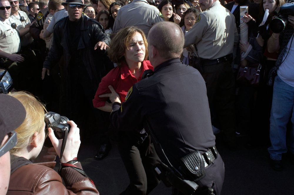 An altercation between a protester and a cop outside of the Santa Clarita, Calif., courtroom circa 2003 during a Michael Jackson trial.
