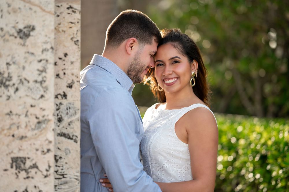 Palm Beach engagement photographers capturing romantic couple in golden hour light