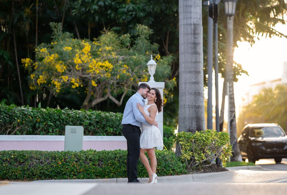 Soft golden hour light on couple during engagement photos in Palm Beach