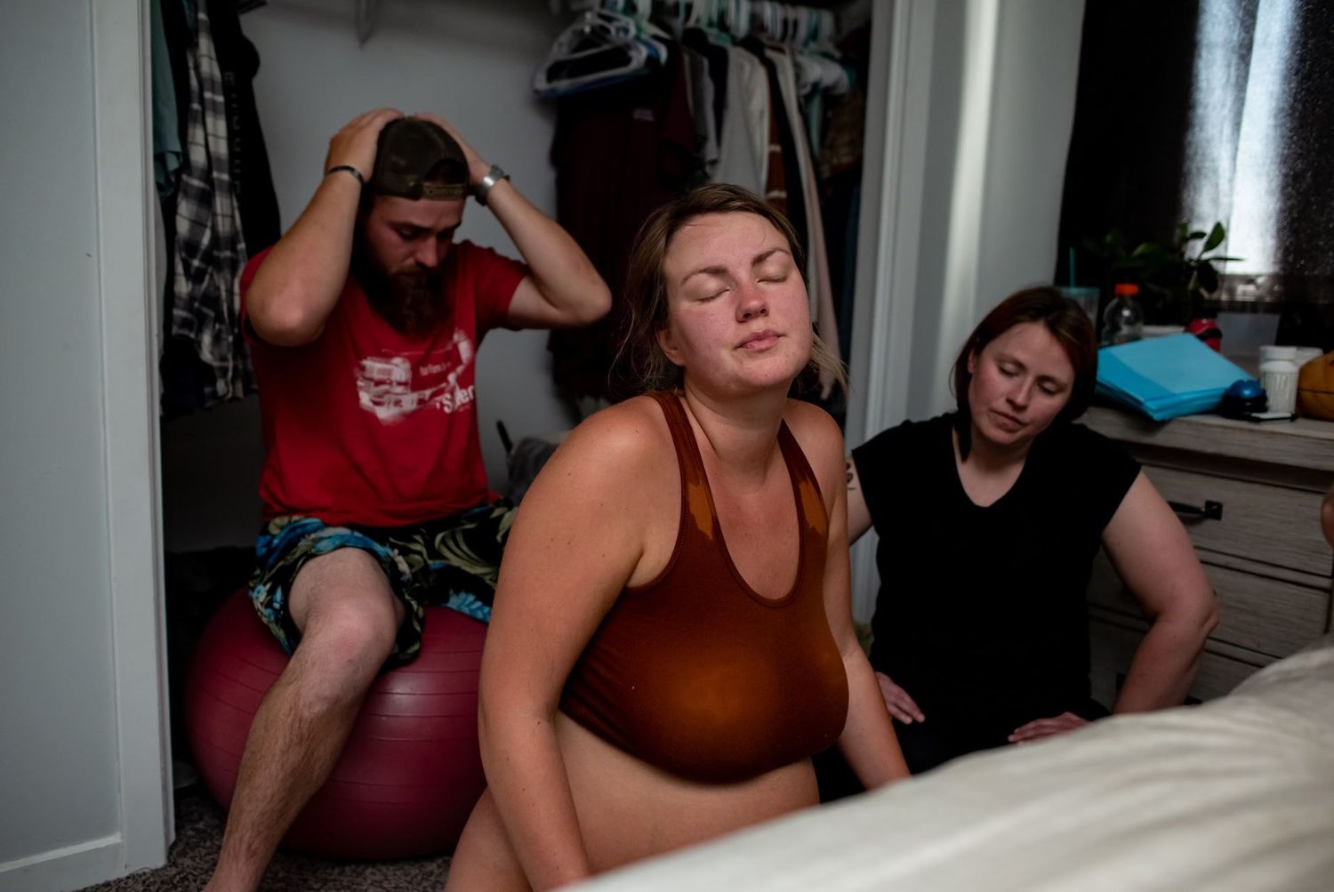 Birth team providing support and encouragement during active labor.