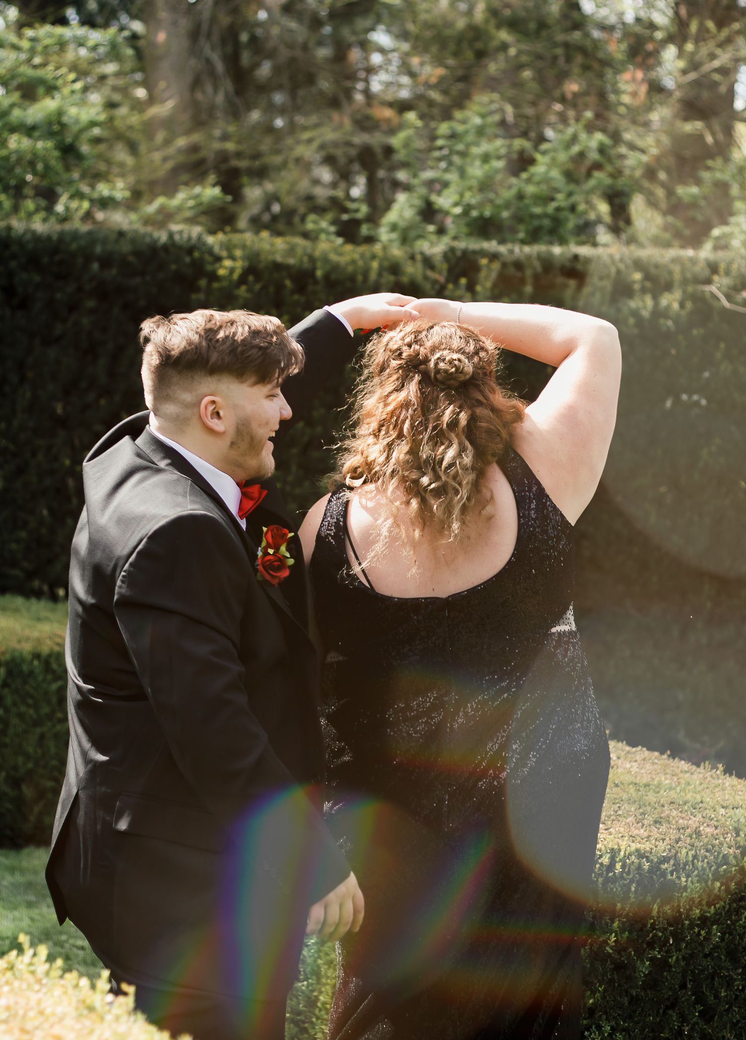 A series of candid dance photos showing movement and joy at an outdoor event under natural lighting.