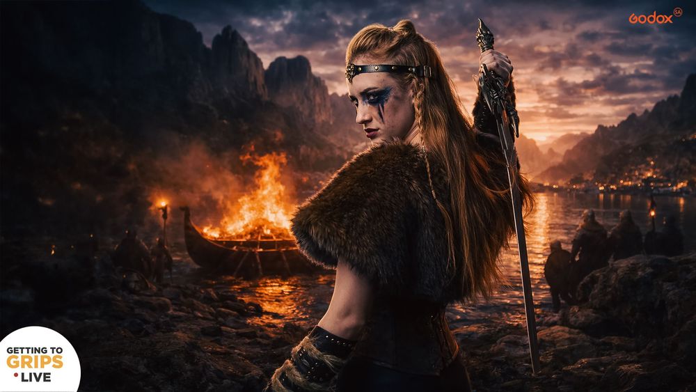 A dark fantasy scene shows a warrior silhouetted against a fiery apocalyptic sky with burning buildings in the background.