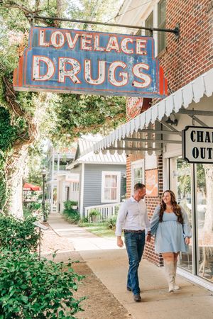 Three connected photos show a vintage town sidewalk scene with brick storefronts and old-fashioned drug store signage.
