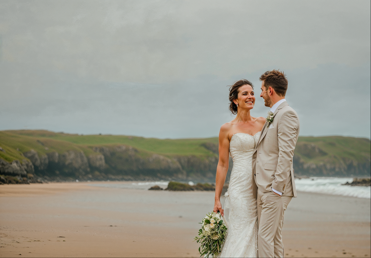A couple shares a romantic moment on a gravel path surrounded by lush green hedges and gardens on their wedding day.